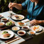 Traditional Asian dining table with chopsticks, rice bowls, dumplings, sushi, and teapot arranged for a cultural meal